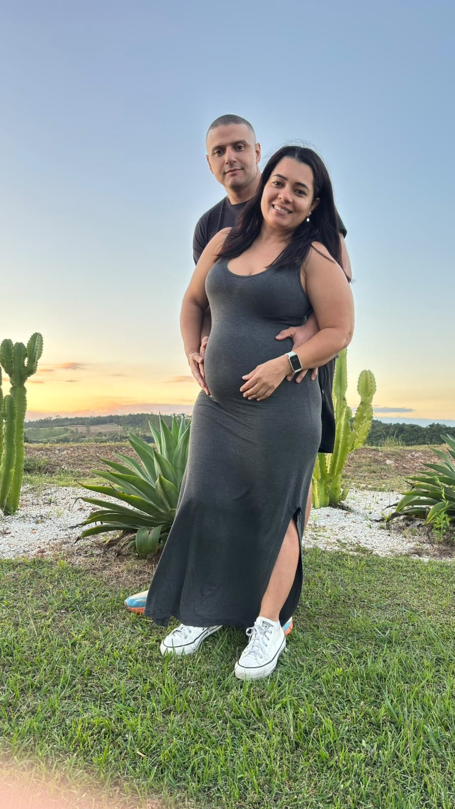 André e sua esposa ao pôr do sol